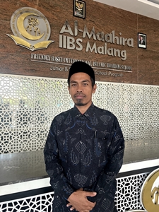 Usman Adhim Hasan, S.H.I.